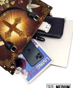 catholight radiance of the cross leather bag elz5c